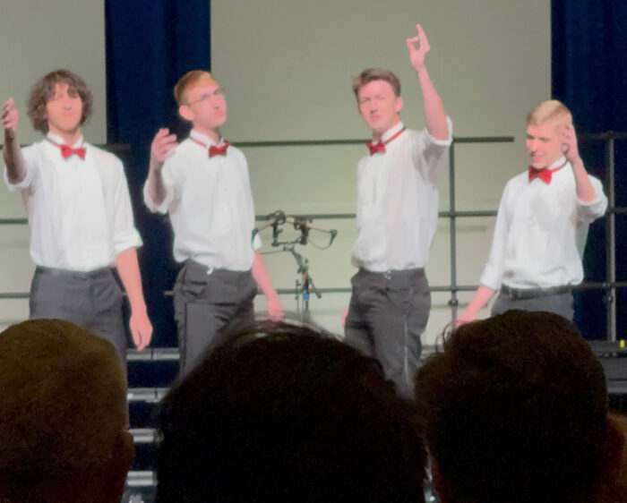 Cicero Prep Barbershop Quartet performing at competition