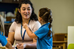 Teacher with a Young Hearts student