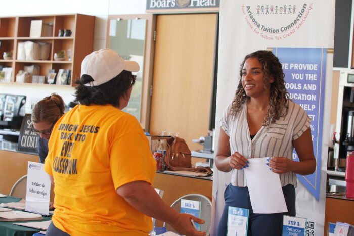 GHCA faculty member talking to a parent