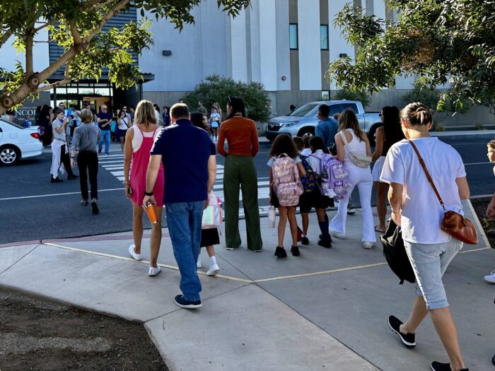 Parents dropping students off at school