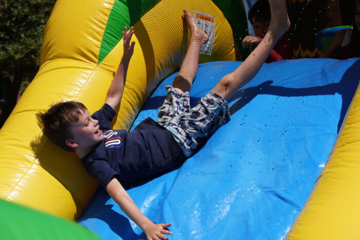 Student going down waterslide