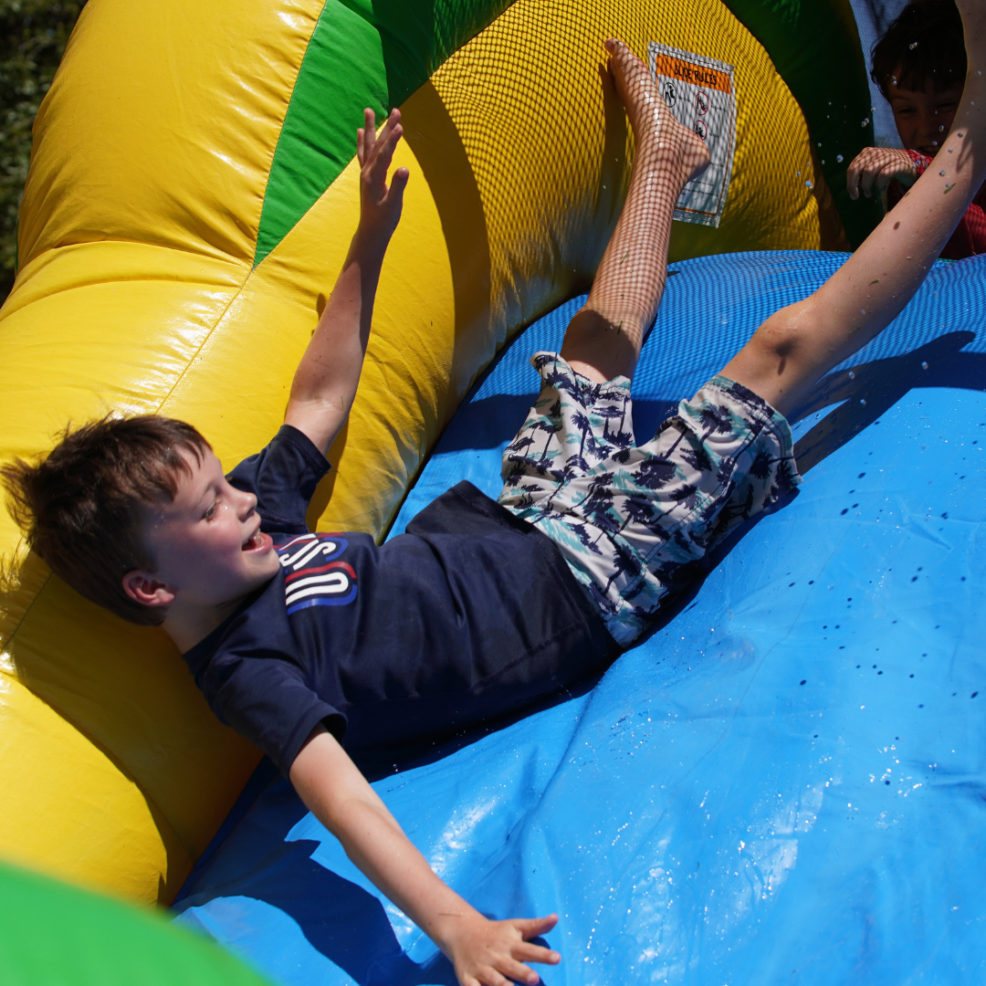 Student going down waterslide