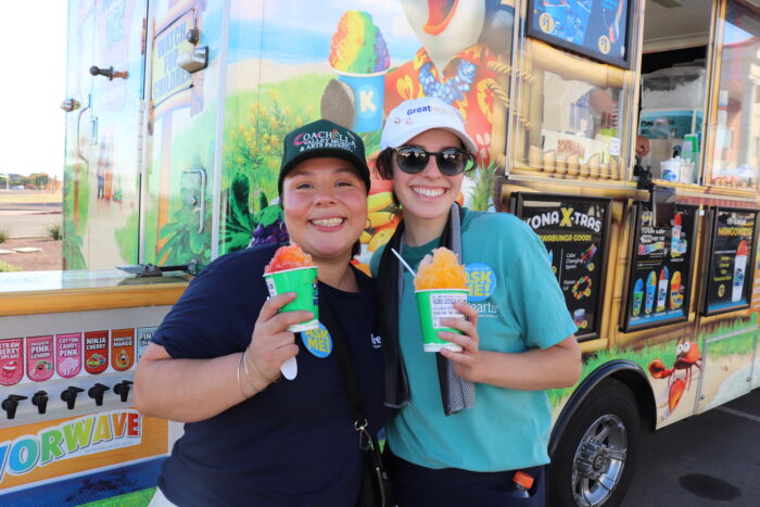 two women with snowcones