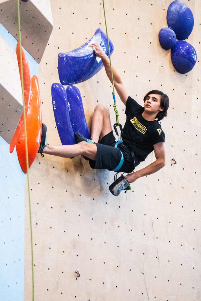 Jackson Day hanging on a climbing wall