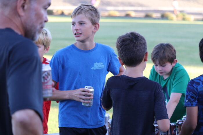 Students drinking root beer at Root Beer Mile