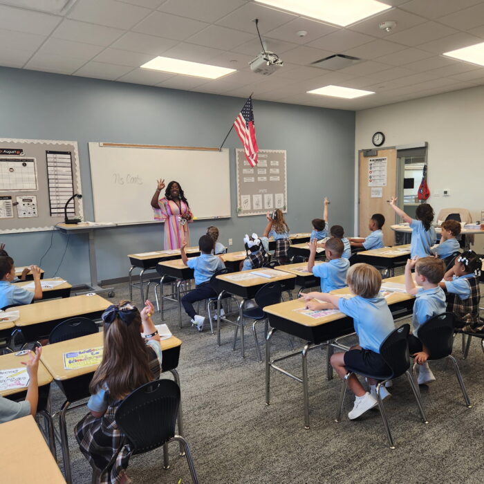 Teacher in front of a classroom of students