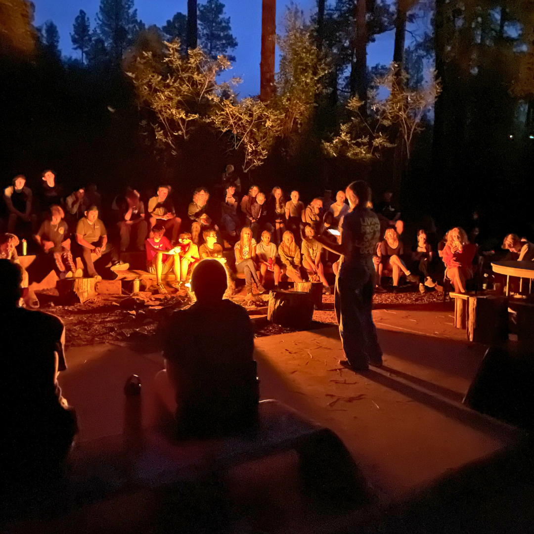 Students around a campfire