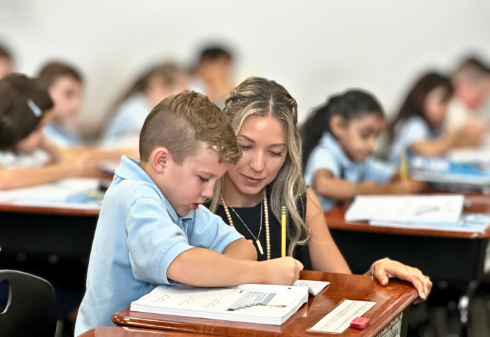 Teacher with student