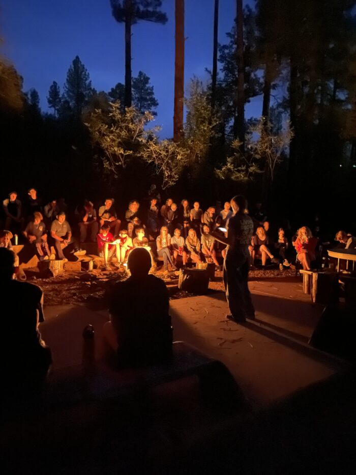 students around a campfire