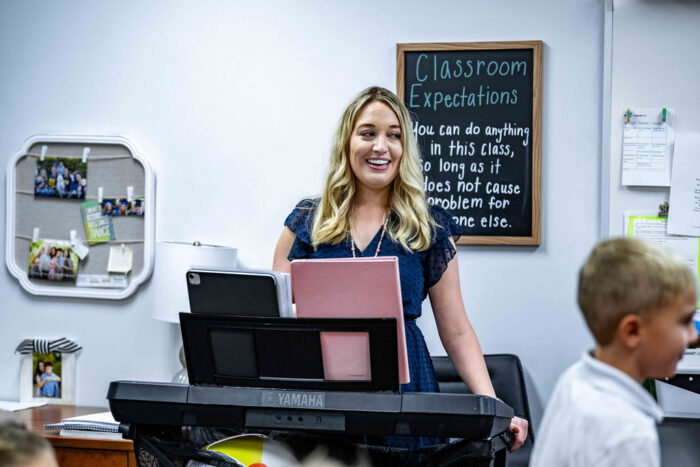 Music teacher at a keyboard