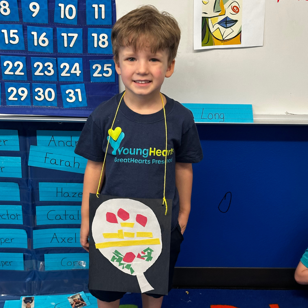 Young Hearts student with artwork