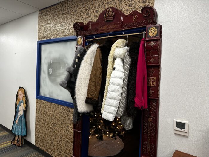 Doorway decorated as a wardrobe