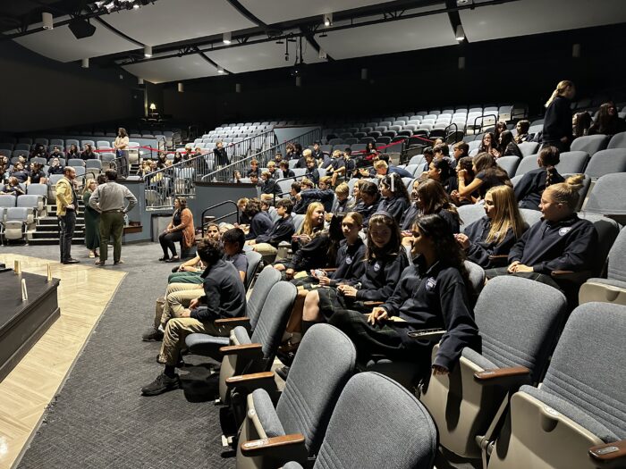 Students sitting in an auditorium