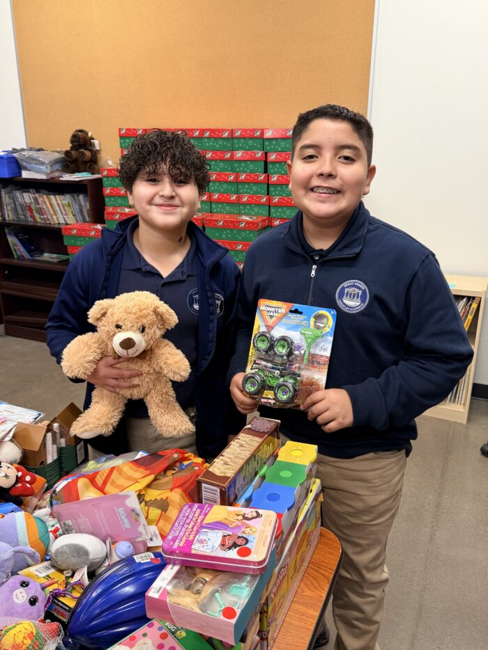 great hearts christian academies students with toys and gifts