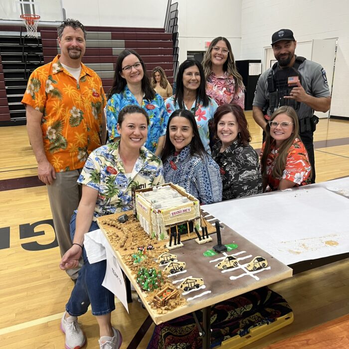Team with Trader Joes Gingerbread House