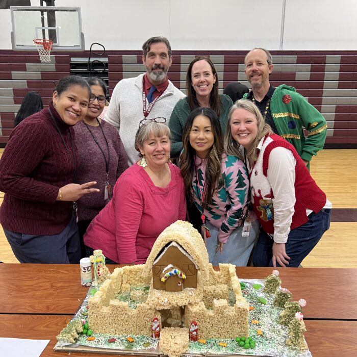 Team with gingerbread castle