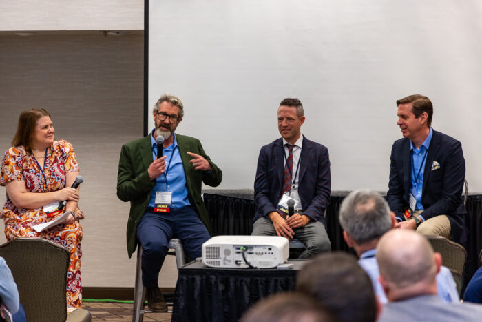 A panel in a breakout room at Symposium