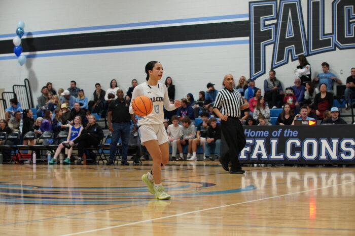 Basketball player on the court at Veritas Prep Hoopcoming