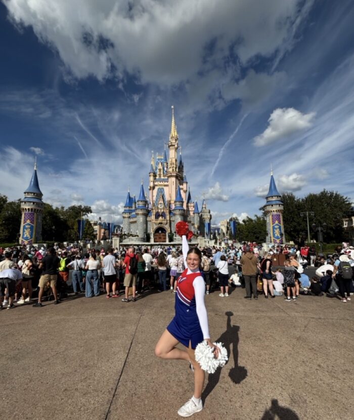Cheerleader in front of WDW Castle