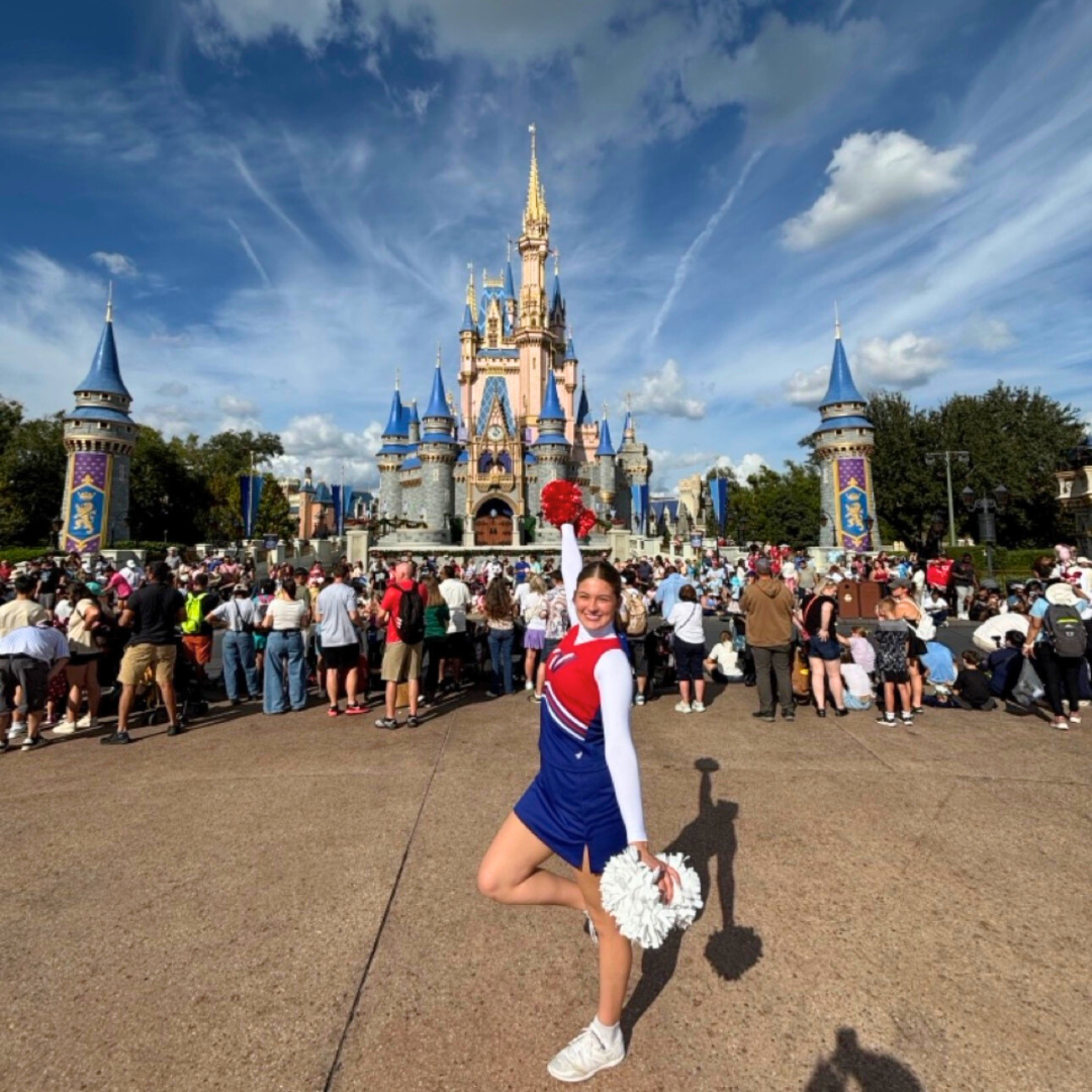 Cheerleader in front of WDW Castle