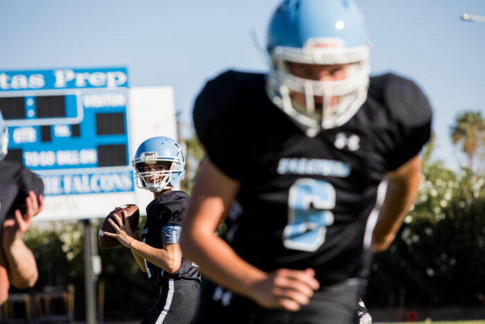 Veritas Prep football players on the field