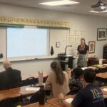 Spring Inservice instructor at front of classroom