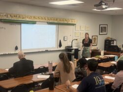 Spring Inservice instructor at front of classroom