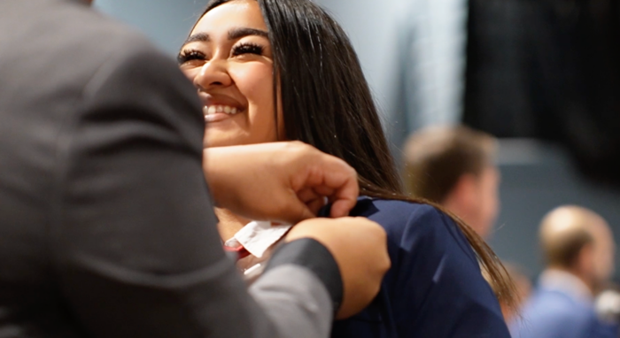 Student receiving a pin