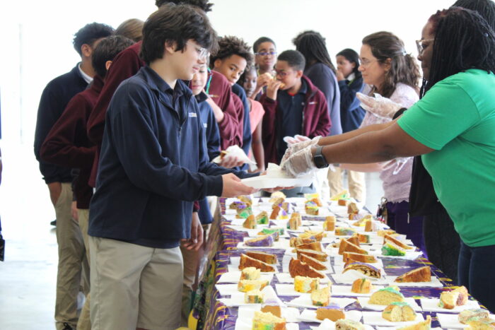 Students getting Kings Cakes