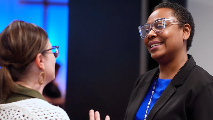 Dr Atolagbe speaking with a parent