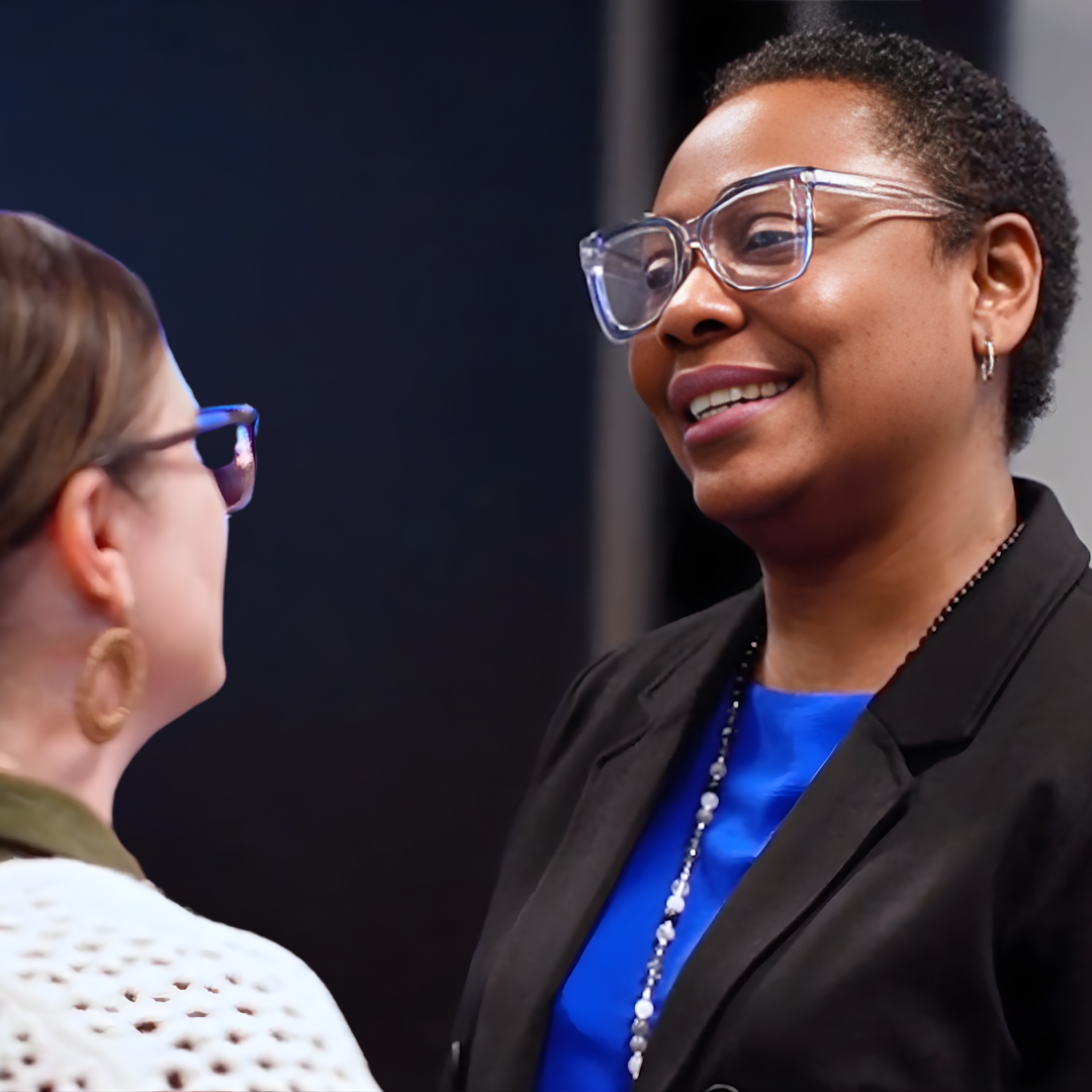 Dr Atolagbe speaking with a parent