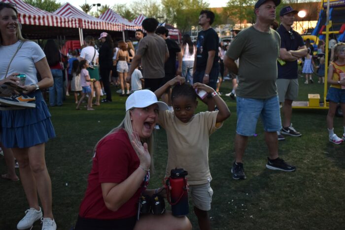 Headmaster and student at carnival