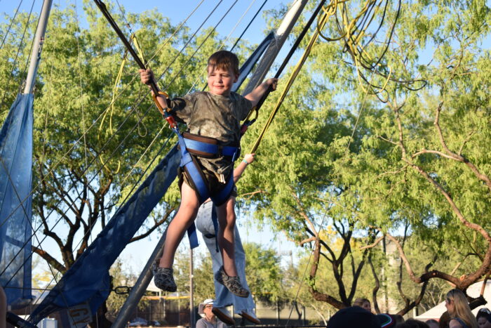 Student on Bungie Swing