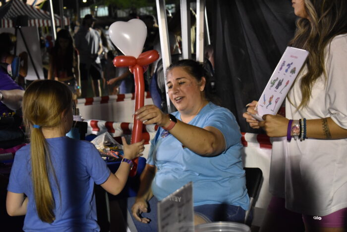 Woman making balloon toys