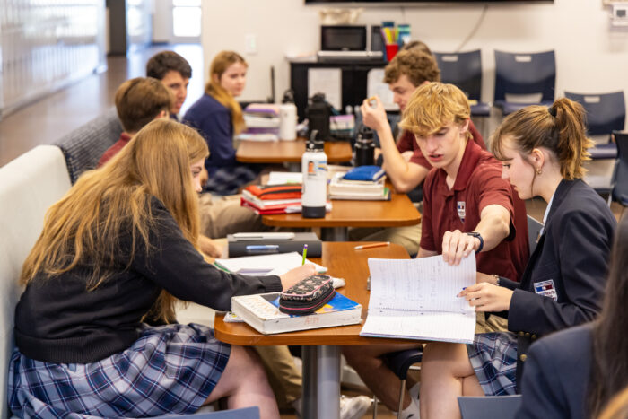 Seniors working together in senior lounge