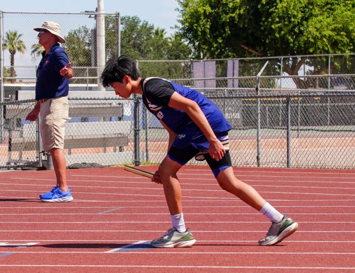 Dean Hebert on the track with a runner