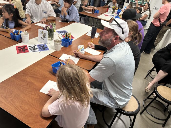 Parent and child at art workshop