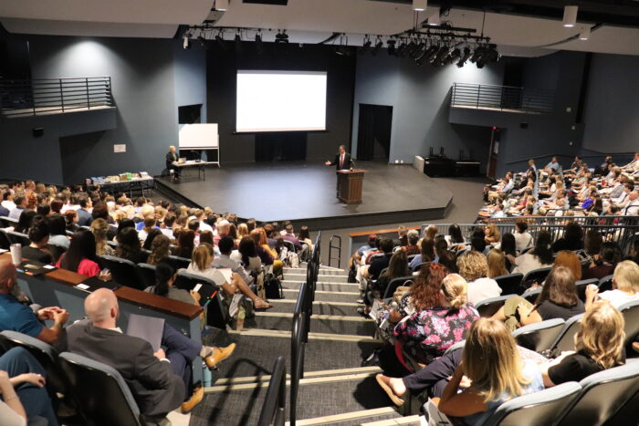Dan speaking to large NFO audience