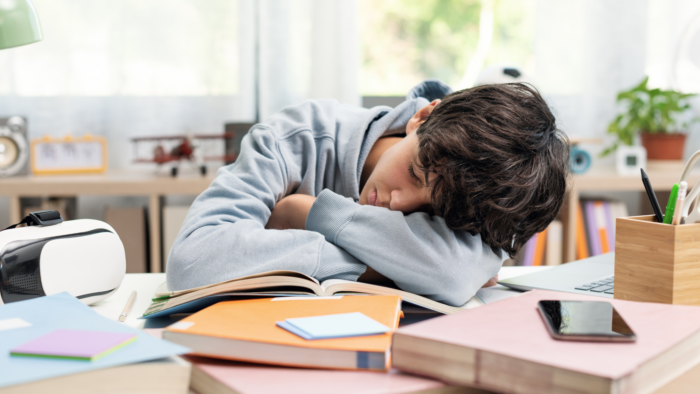 Sleeping student at desk