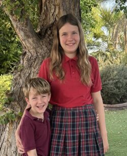 A girl and a boy in school uniforms