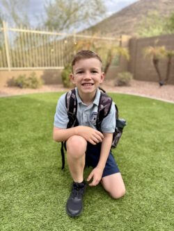 Young boy in school uniform