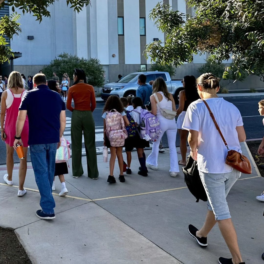 Parents dropping students off at school