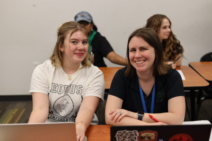Michelle Paul with a student