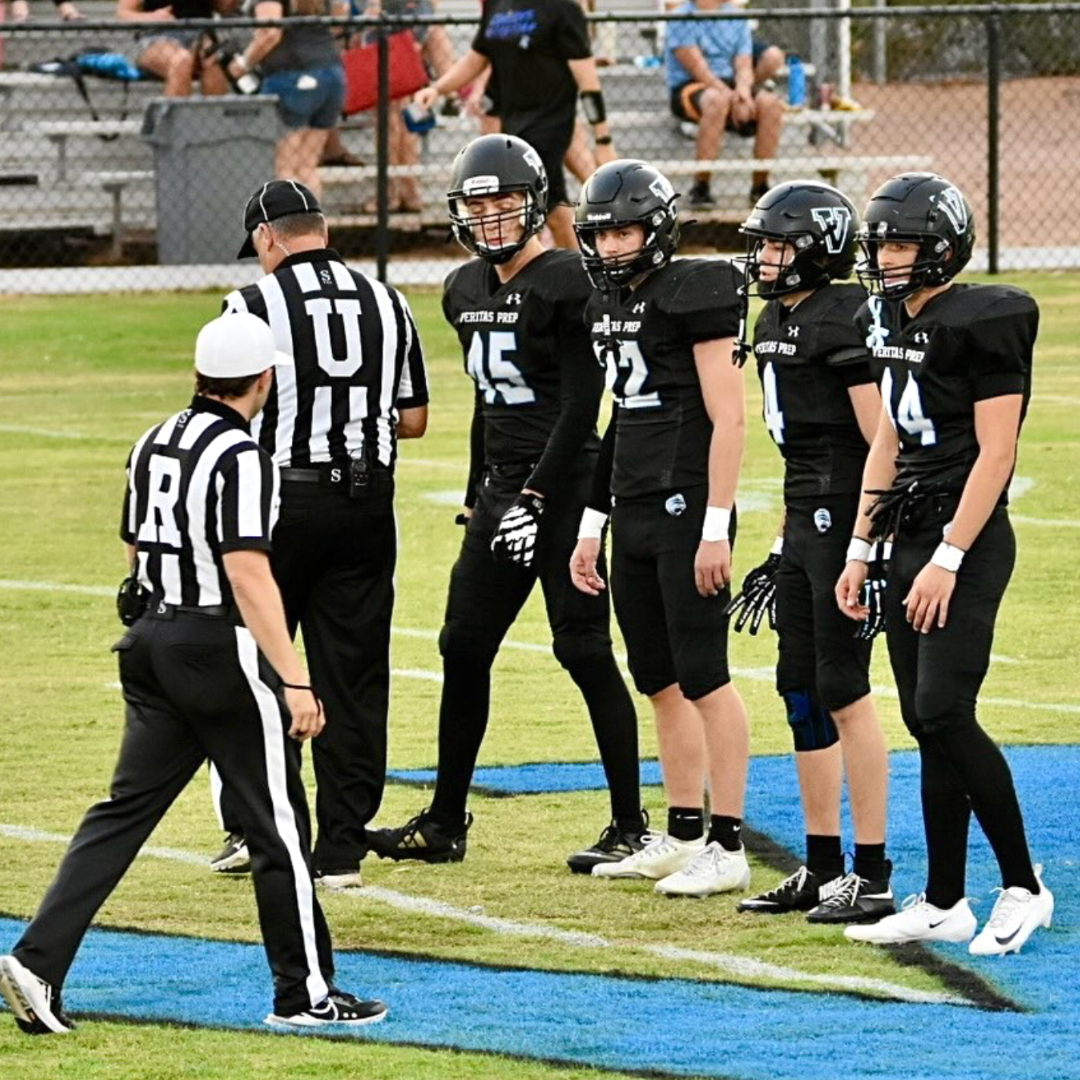 Veritas Prep football players on field