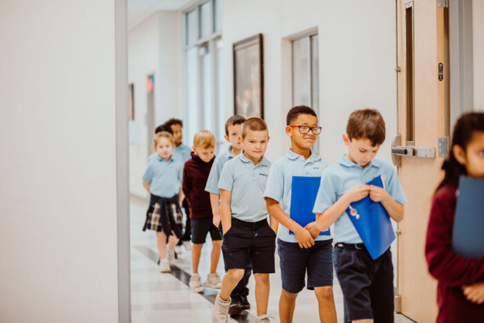 Students walking down a hallway